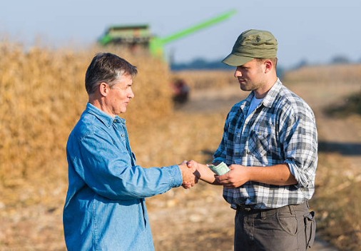 Farmer and Retailer Handshake